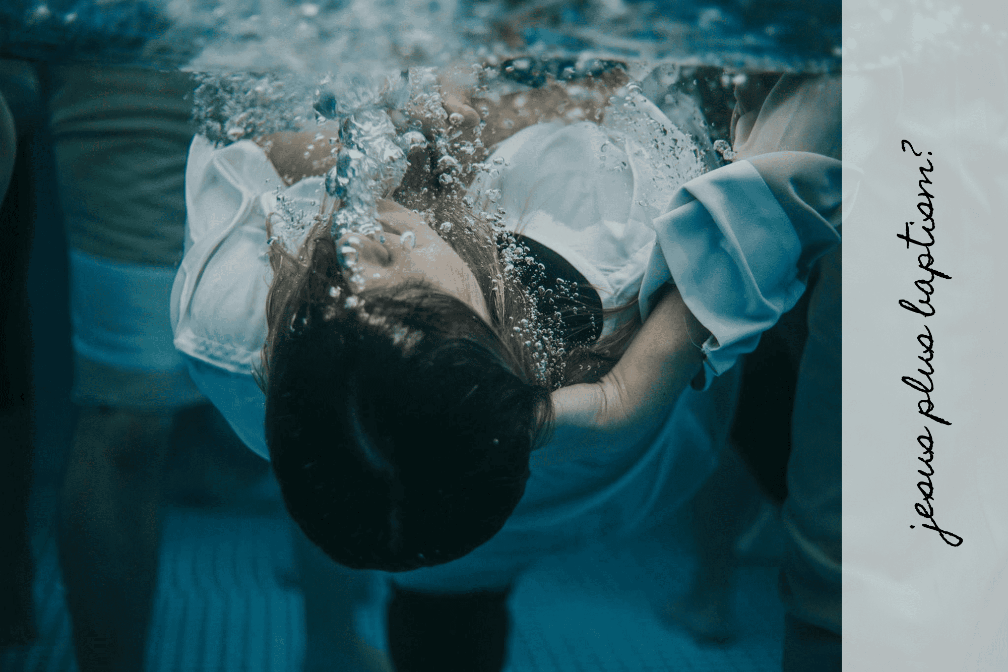 A woman is underwater during baptism